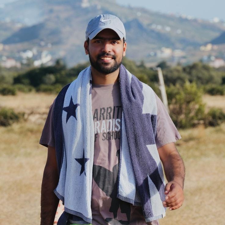 Kaveri Mehta, Lead Design Curator at Chronovex Partners, reviewing corporate floral arrangements